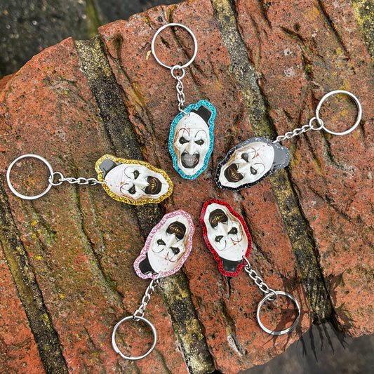 The Terrifier Glitter Keyring - Horror movie Keyring. Art the Clown Keyring