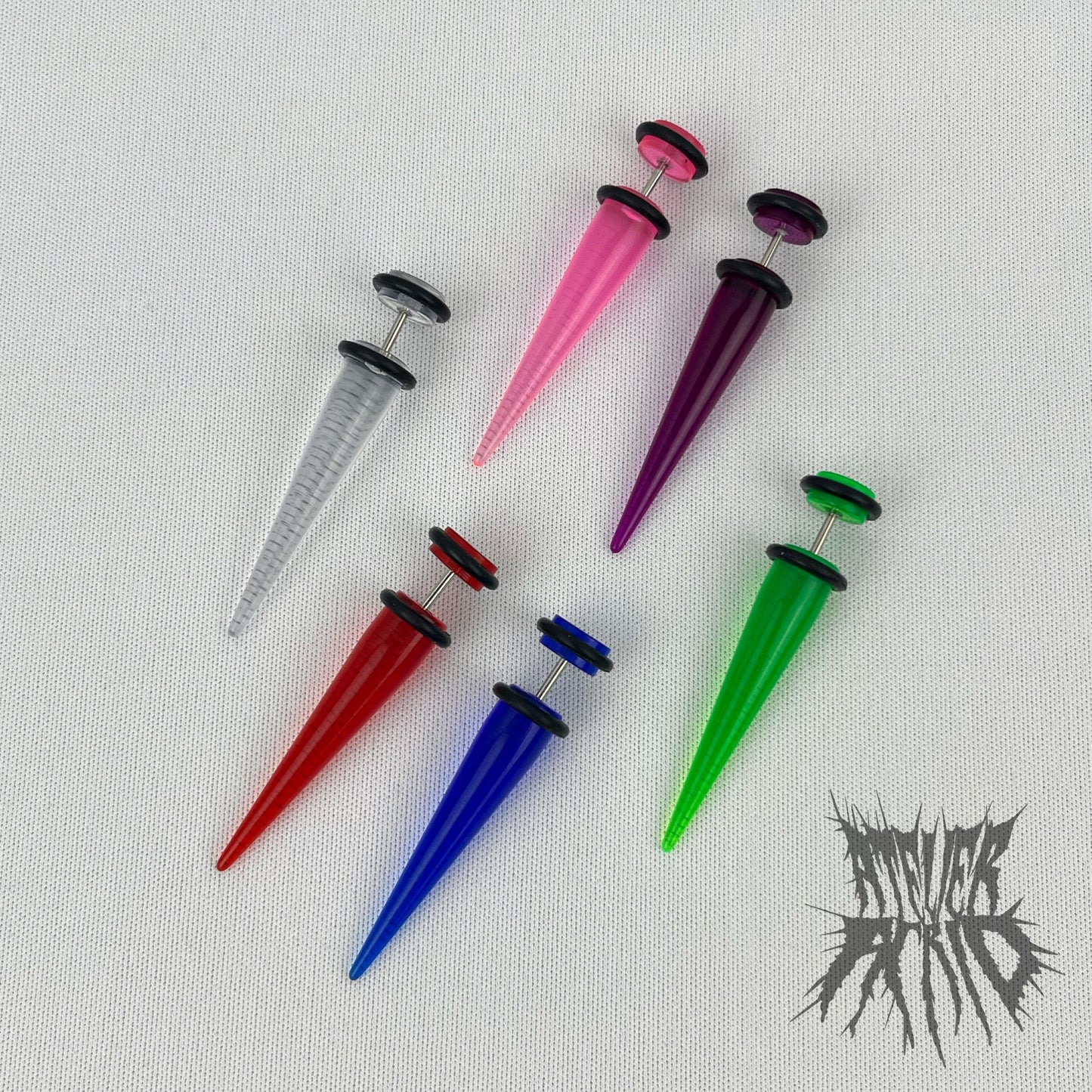 The Fake Stretcher Earrings (translucent)