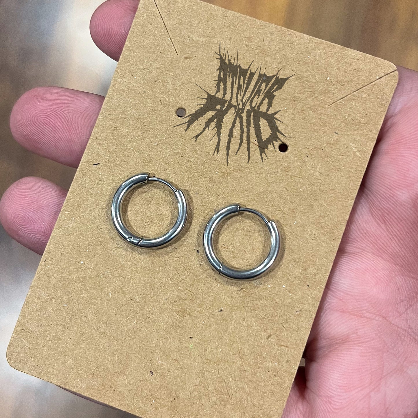 The Orbit Earrings- Stainless Steel hinged hoop earrings