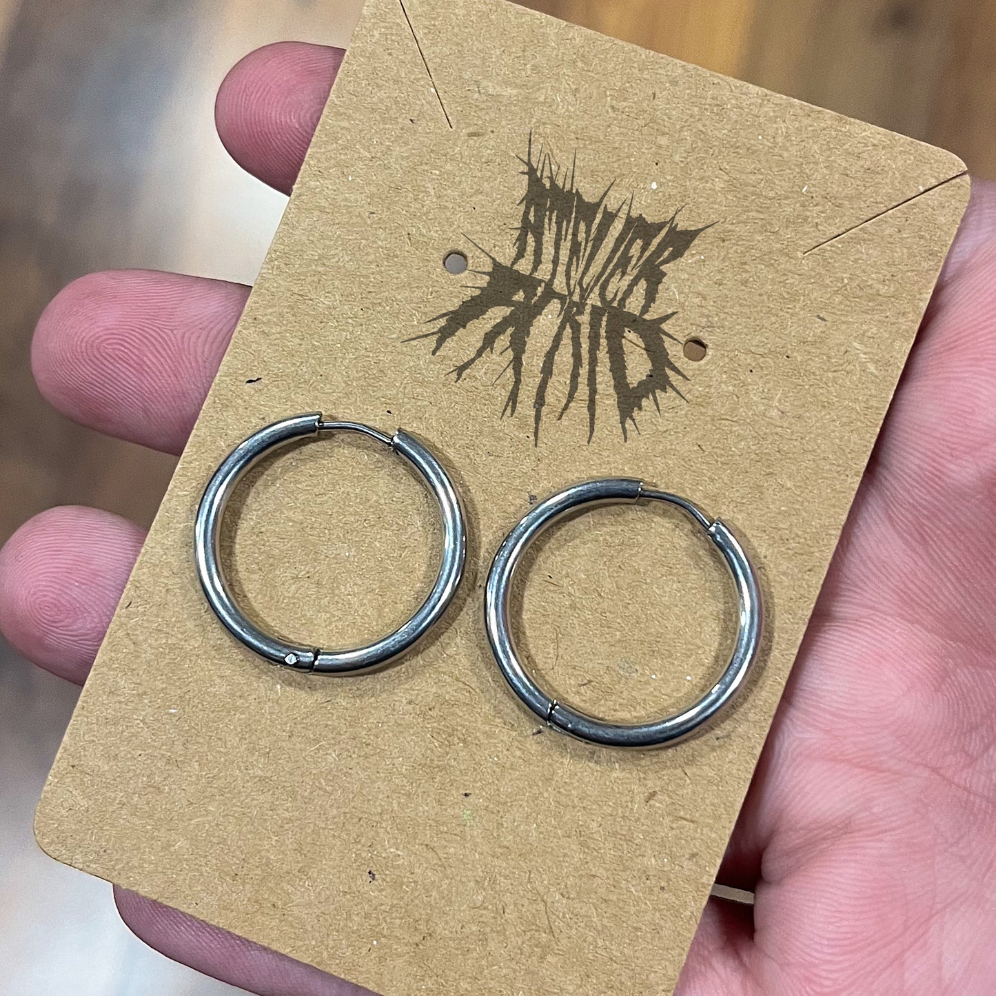 The Orbit Earrings- Stainless Steel hinged hoop earrings