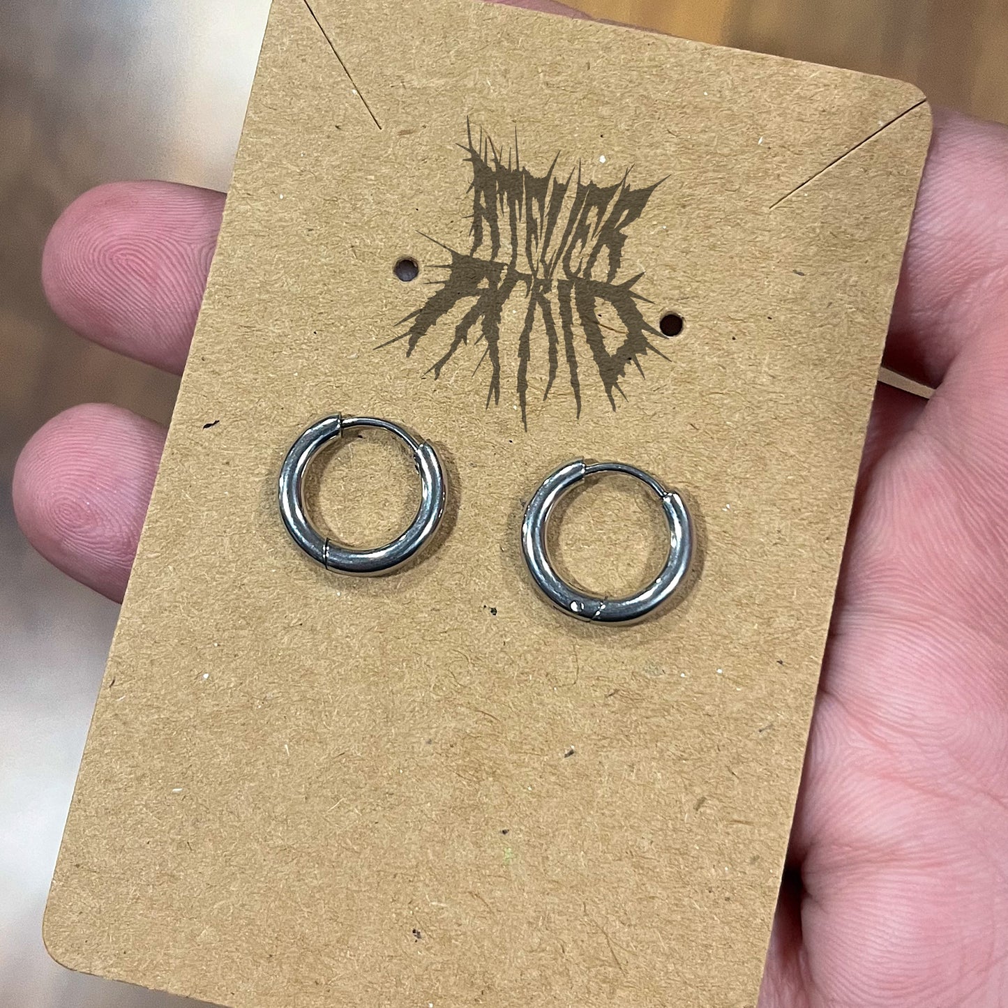 The Orbit Earrings- Stainless Steel hinged hoop earrings