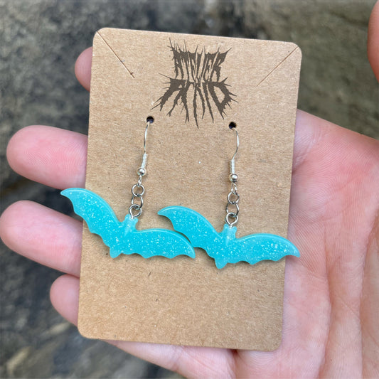 The Bella Earrings - Blue pastel glittery bat earrings