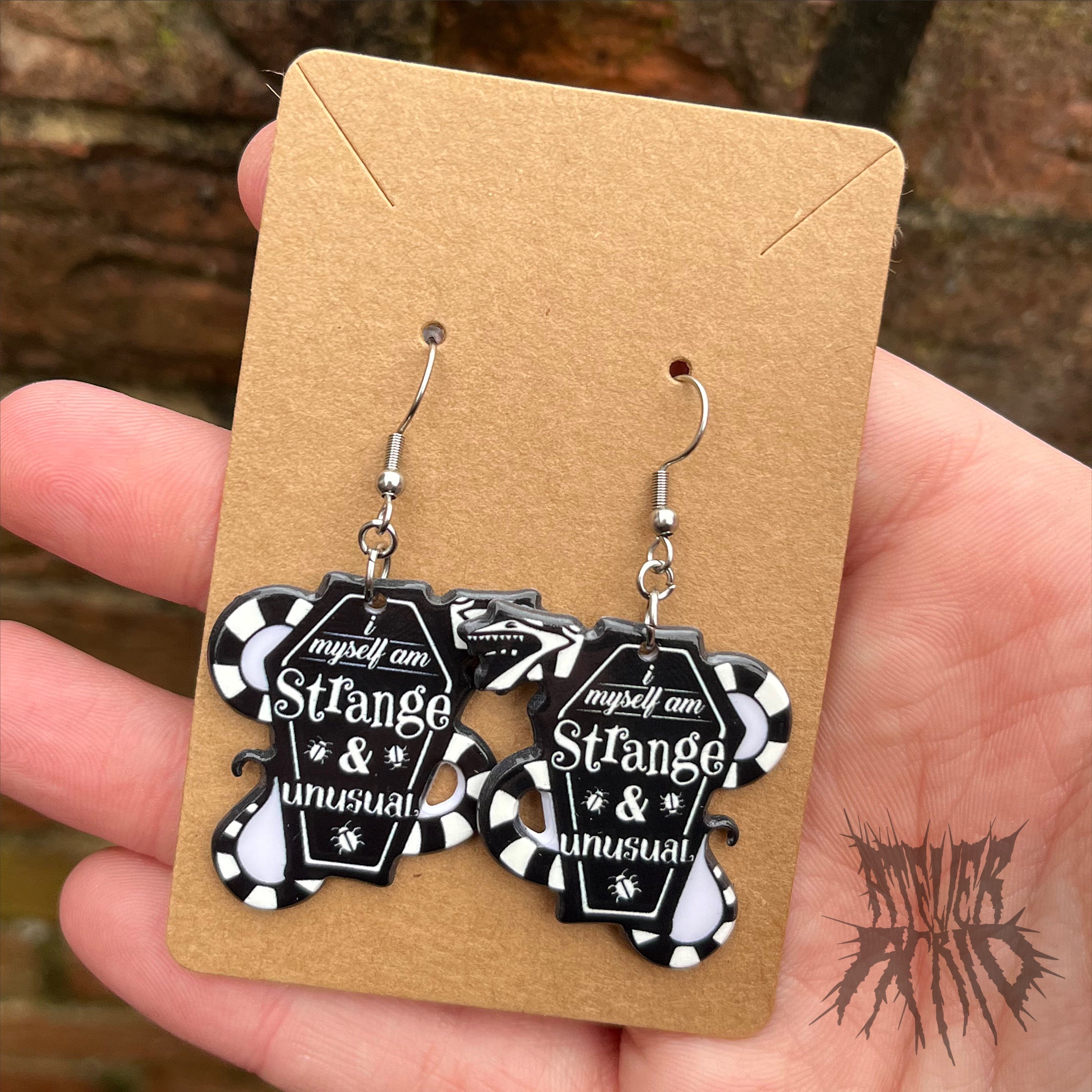 Strange earrings clearance